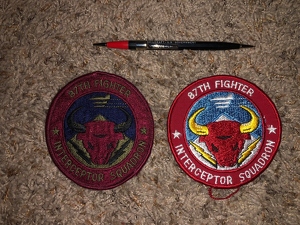Pen and Patches of Darold Breuer 87 FIS Weapons